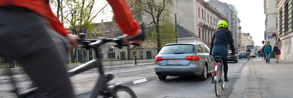 Cyclists on busy street